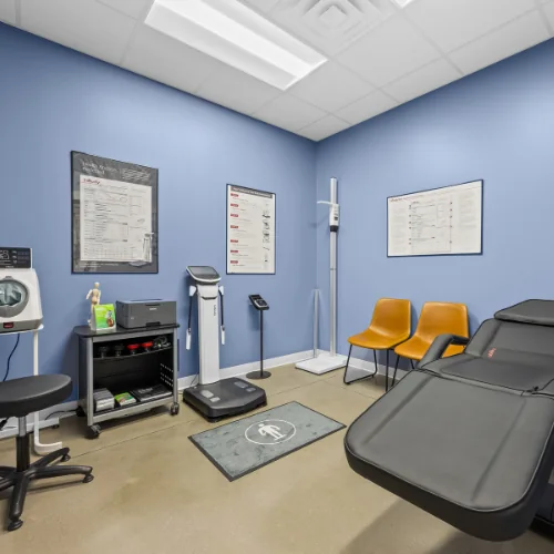 Victory Health & Wellness therapy and optimization lab in Austin with body composition analyzer, red light therapy bed, and stadiometer